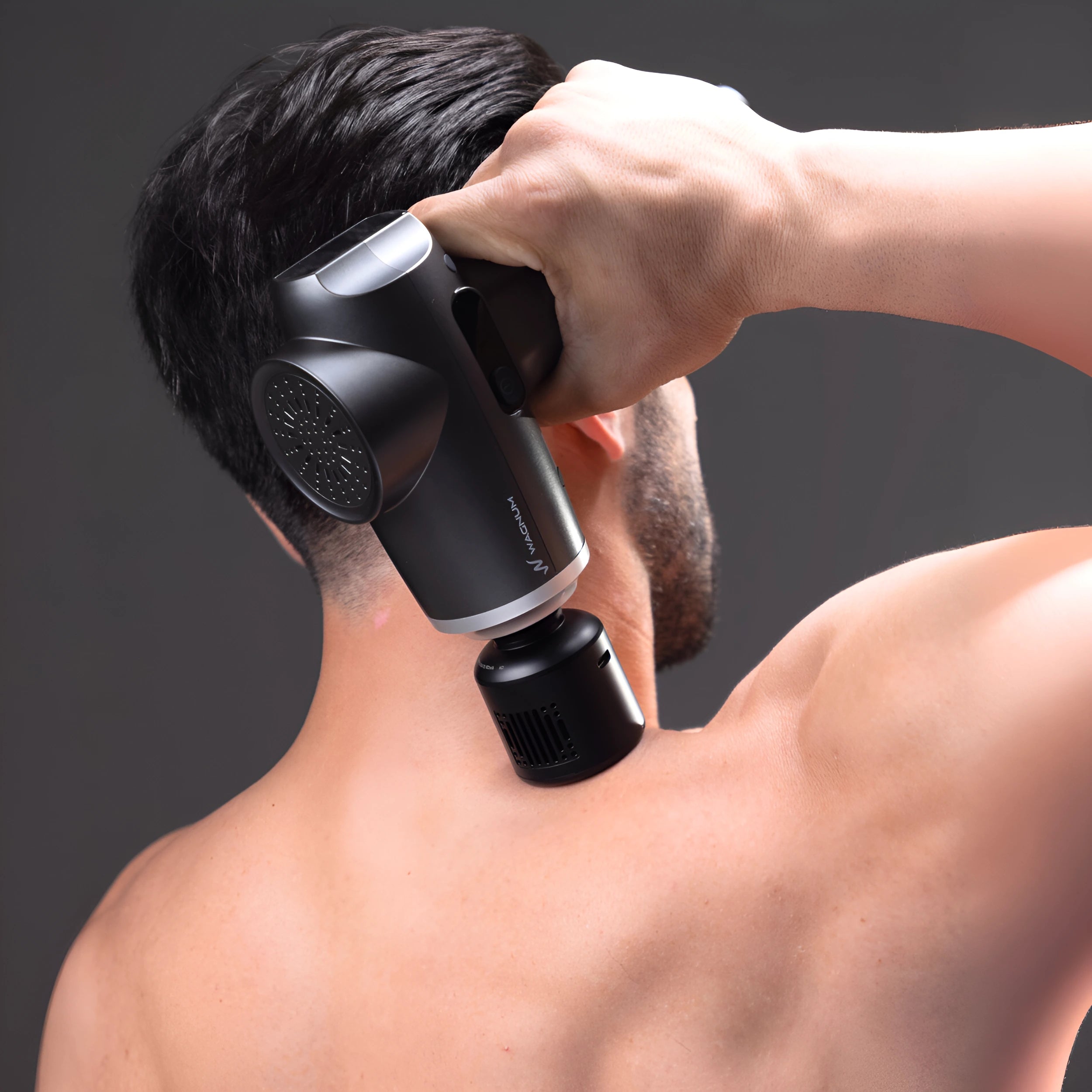 S5 percussive massage gun with hot and cold attachment head.